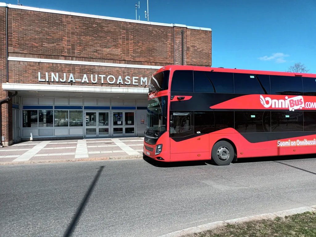 [:en]Onnibus company's red bus at Oulu bus station.[:]
