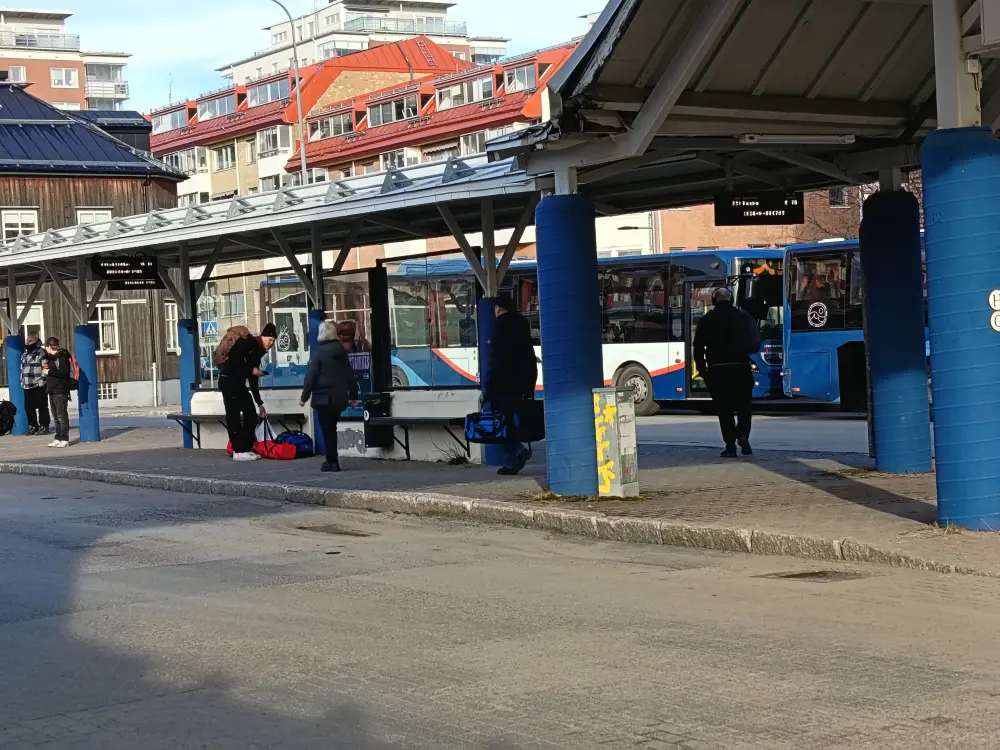 Passengers wait for the bus gate at Luleå bus station.