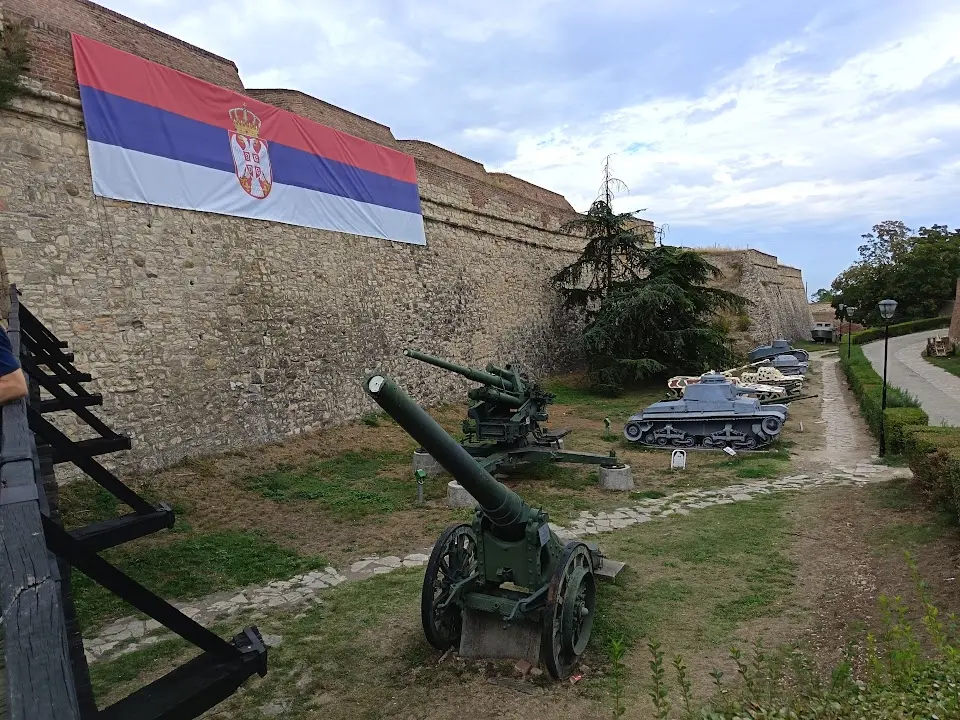 Weapons are visible in Belgrade.