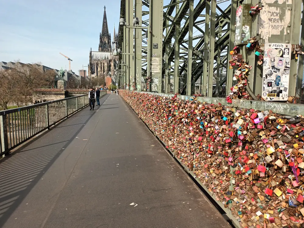 Love locks on the railing of the Hohenzollern Bridge in Cologne.